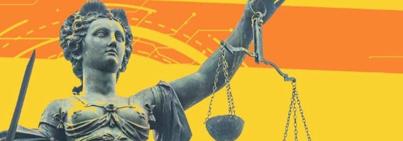 Lady Justice holds scales against an orange and yellow background.