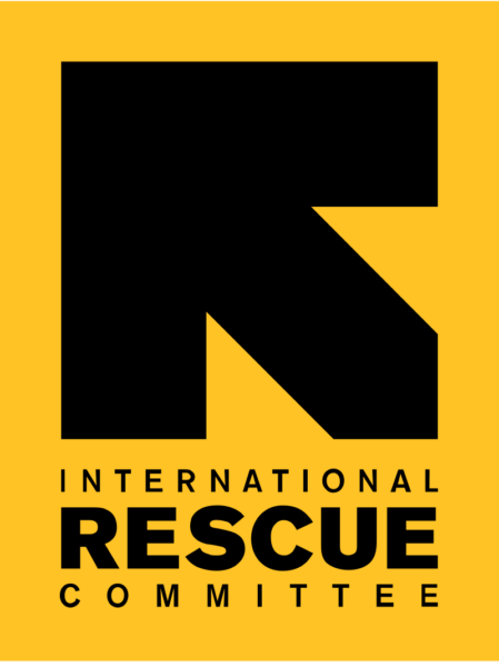 A large black arrow on a bright yellow background, the arrow is pointing to the upper left, and below it is black text stating International Rescue Committee